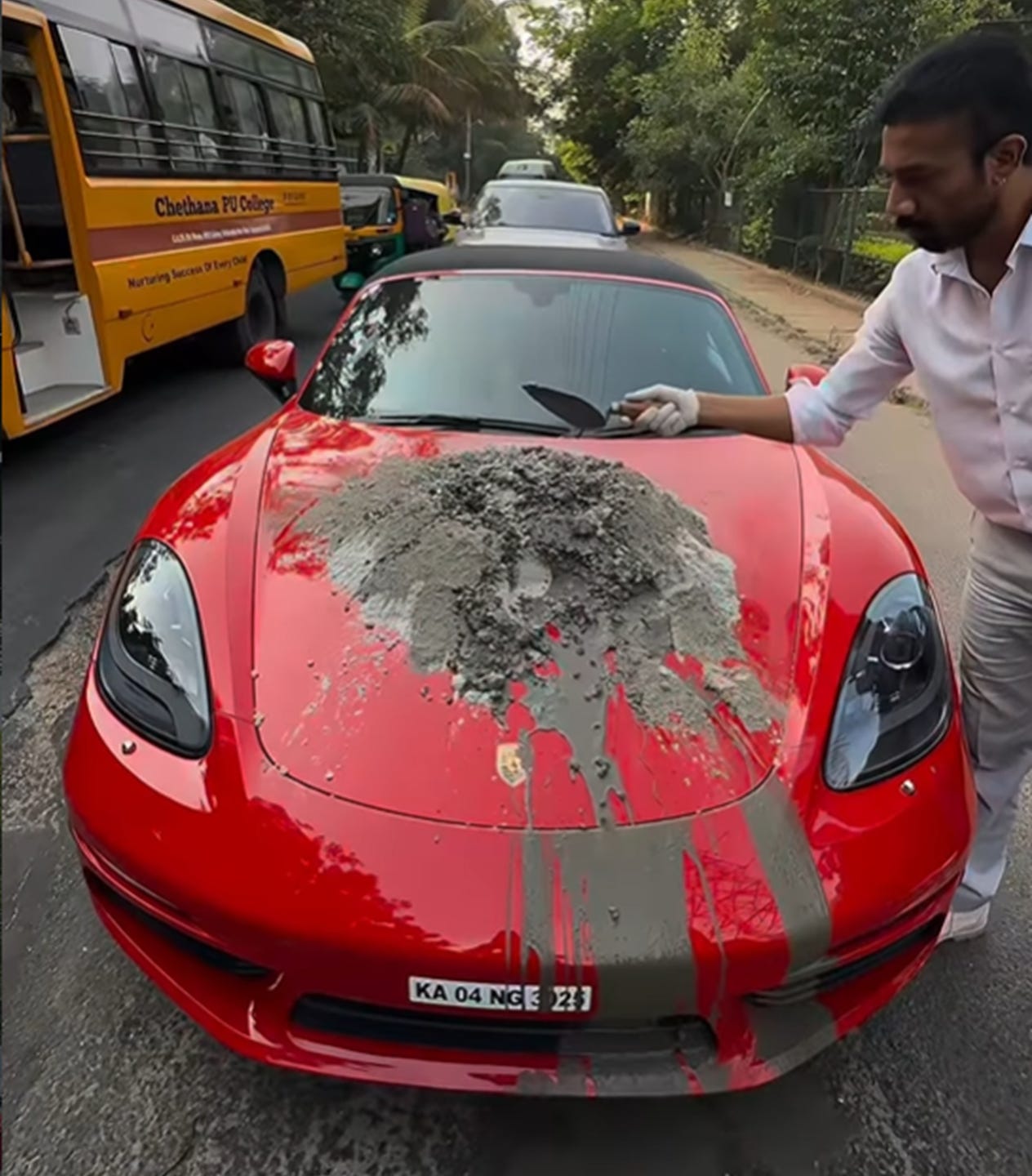 Viral Outrage: Man Mixes Concrete on Porsche Boxster Hood, Sparks Investigation and Debate Viral Outrage: Man Mixes Concrete on Porsche Boxster Hood, Sparks Investigation and Debate