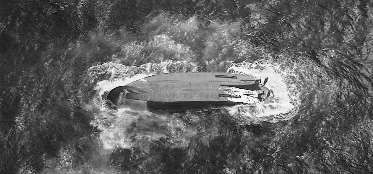 U.S. Cargo Vessel Overturns After Typhoon: Six Crew Members Feared Missing in Maritime Tragedy