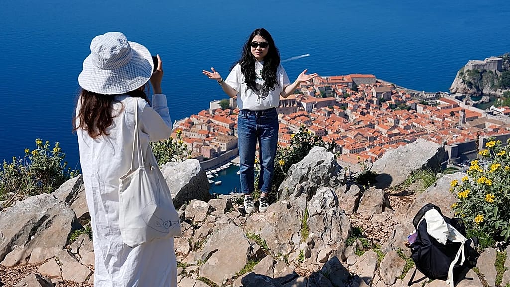 The Golden Cage: Summer Travel Holds Economy Hostage to Unrest