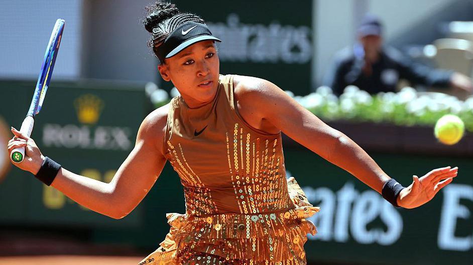 Court Couture & Commercial Calculation: Osaka’s French Open Golden Statement Court Couture & Commercial Calculation: Osaka’s French Open Golden Statement