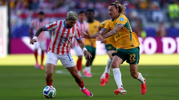 Australia Secures World Cup Knockout Berth Following Tense Stalemate with Paraguay