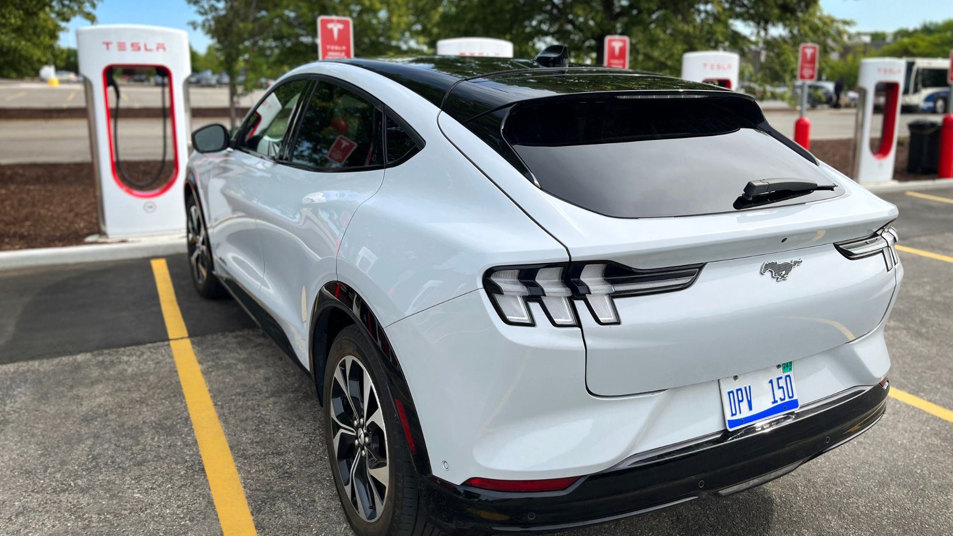 Tesla’s Charger Coup: Ford Deal Reinvents EV Power Plays, Echoes Global Tech Divides