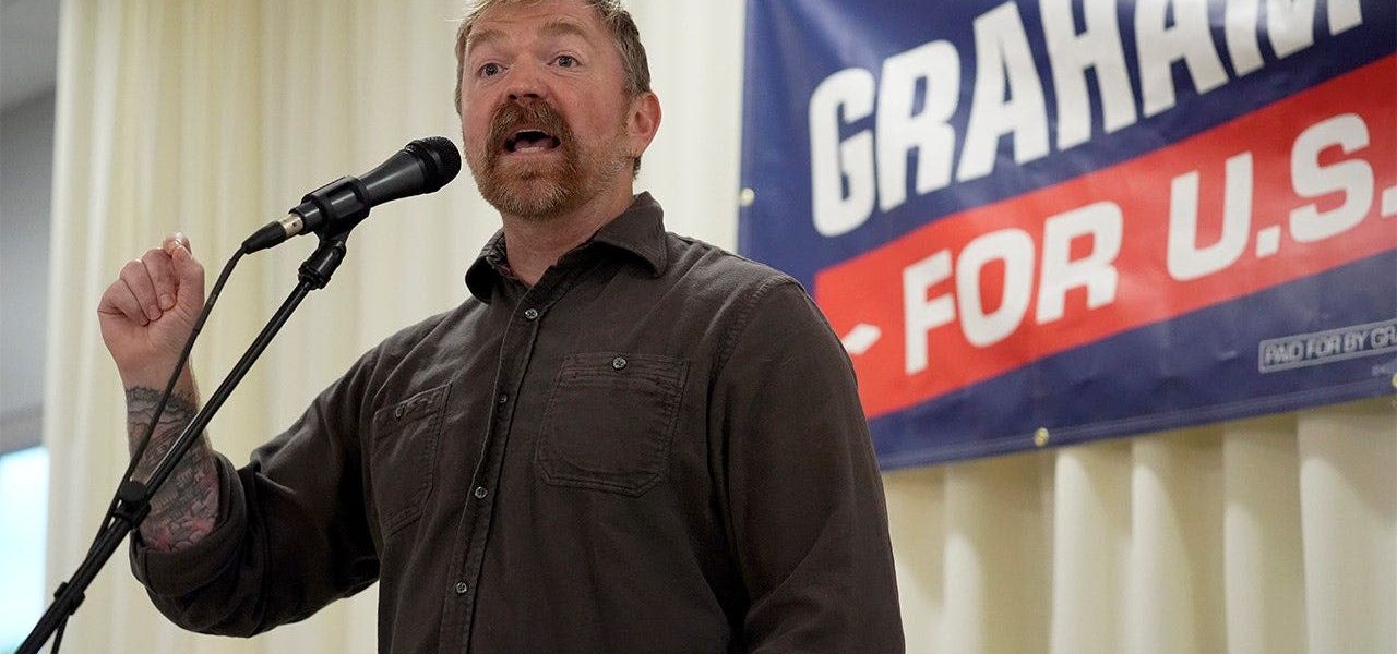 Platner’s Billionaire ‘Cage’ Rhetoric Ignites Far-Left Base, Rattles Establishment