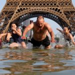 Scorching France Seeks Solace: Record Heatwave Drives City Dwellers to Hotels Scorching France Seeks Solace: Record Heatwave Drives City Dwellers to Hotels