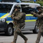 Man Dies Following Knife Attack at German Bank, Suspect Barricaded Inside