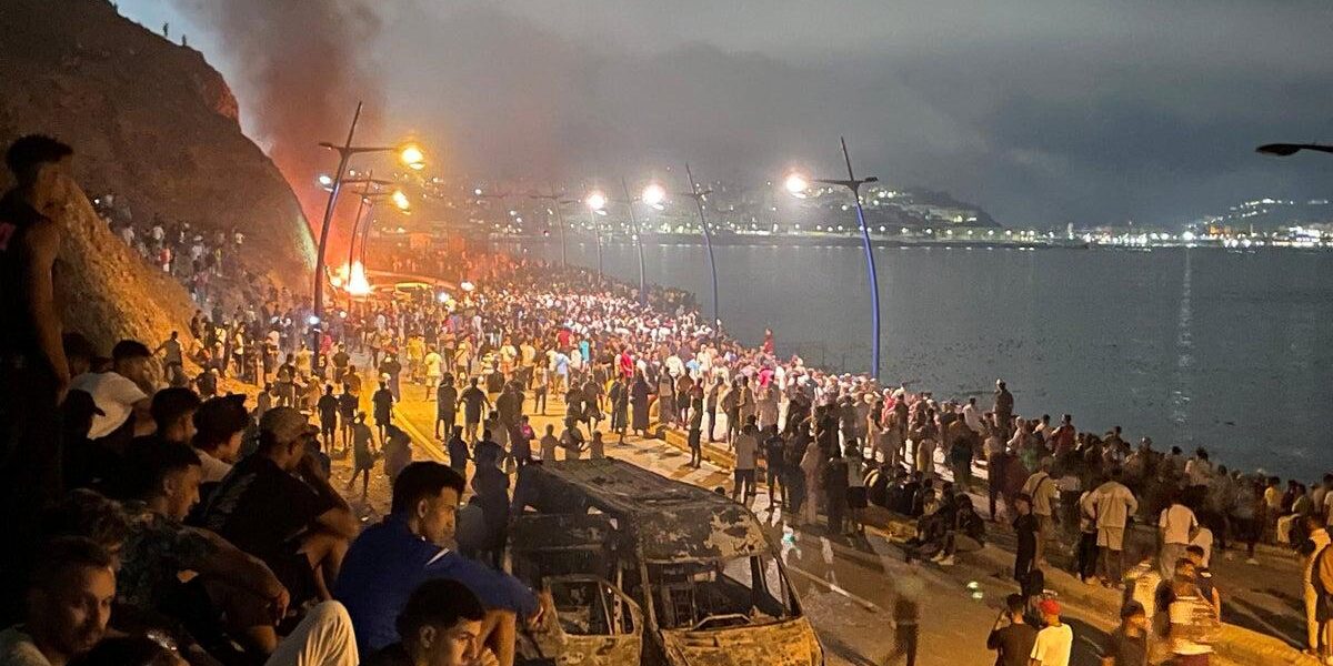 Ceuta Crisis: 18 Dead, Thousands of Migrants Rush Spanish Border Ceuta Crisis: 18 Dead, Thousands of Migrants Rush Spanish Border