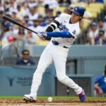 Ohtani’s Knee Fluid: Dodgers Star Navigates Health, Global Economic Pressure Ohtani’s Knee Fluid: Dodgers Star Navigates Health, Global Economic Pressure