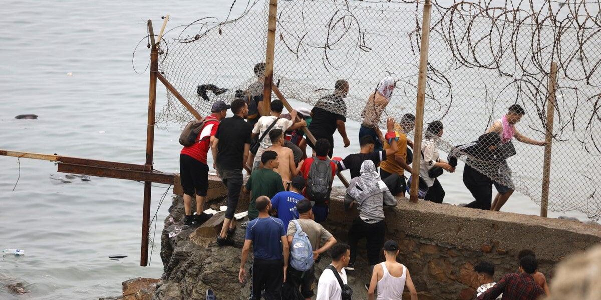 Deadly Migrant Crisis Overwhelms Ceuta: 49,000 Cross Spanish Enclave Deadly Migrant Crisis Overwhelms Ceuta: 49,000 Cross Spanish Enclave