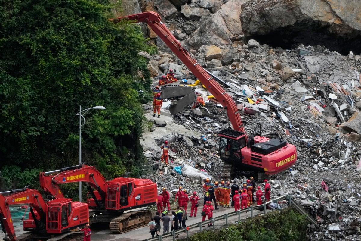 Race Against Time: Rescuers Search for Survivors After China Landslide Kills 8 Race Against Time: Rescuers Search for Survivors After China Landslide Kills 8