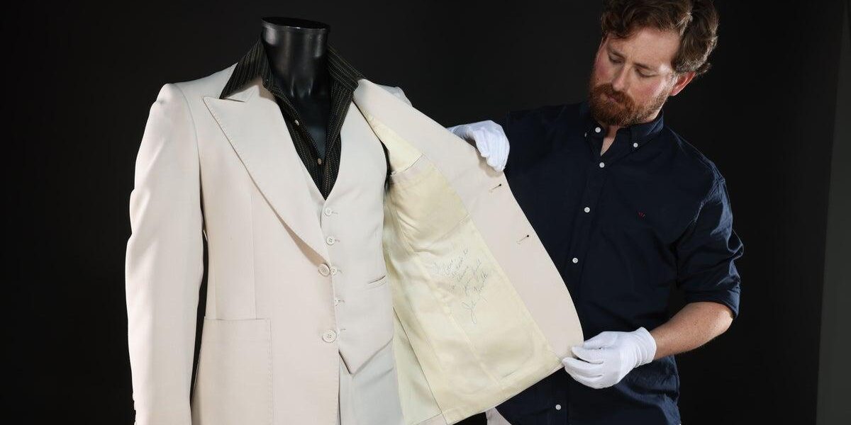 John Travolta’s Iconic ‘Saturday Night Fever’ Suit Among Movie Props Auctioned John Travolta’s Iconic ‘Saturday Night Fever’ Suit Among Movie Props Auctioned