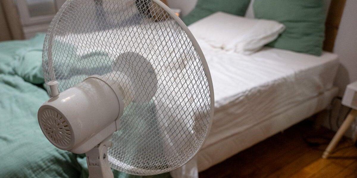 Expert Weighs Pros and Cons of Sleeping with a Fan On Expert Weighs Pros and Cons of Sleeping with a Fan On