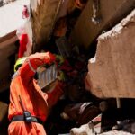 Caracas Aftershocks: Volunteers Bear Grim Burden Amid Diplomatic Churn
