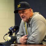 Ann Arbor’s Gray Eminence: Can Kyle Whittingham Steady Michigan’s Rocking Ship? Ann Arbor’s Gray Eminence: Can Kyle Whittingham Steady Michigan’s Rocking Ship?