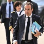 French Prime Minister Faces Public Heckling Amid Wildfire Aid Announcement