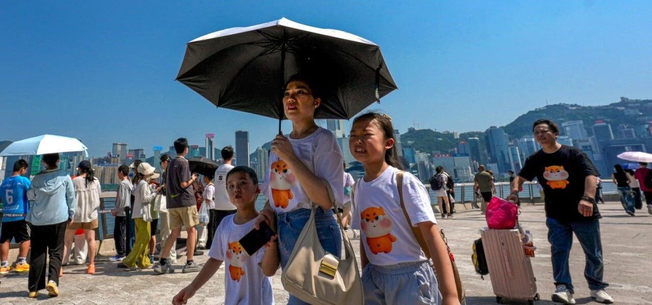 Hong Kong Sets New Record for Hottest Day Amid Typhoon Dolphin