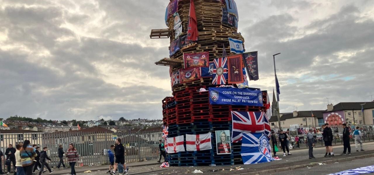 Sinn Féin Condemns Burning of First Minister’s Images on Derry Bonfire