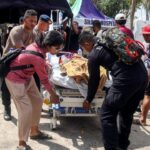 Rescuers Search for Survivors After Powerful Indonesia Earthquake