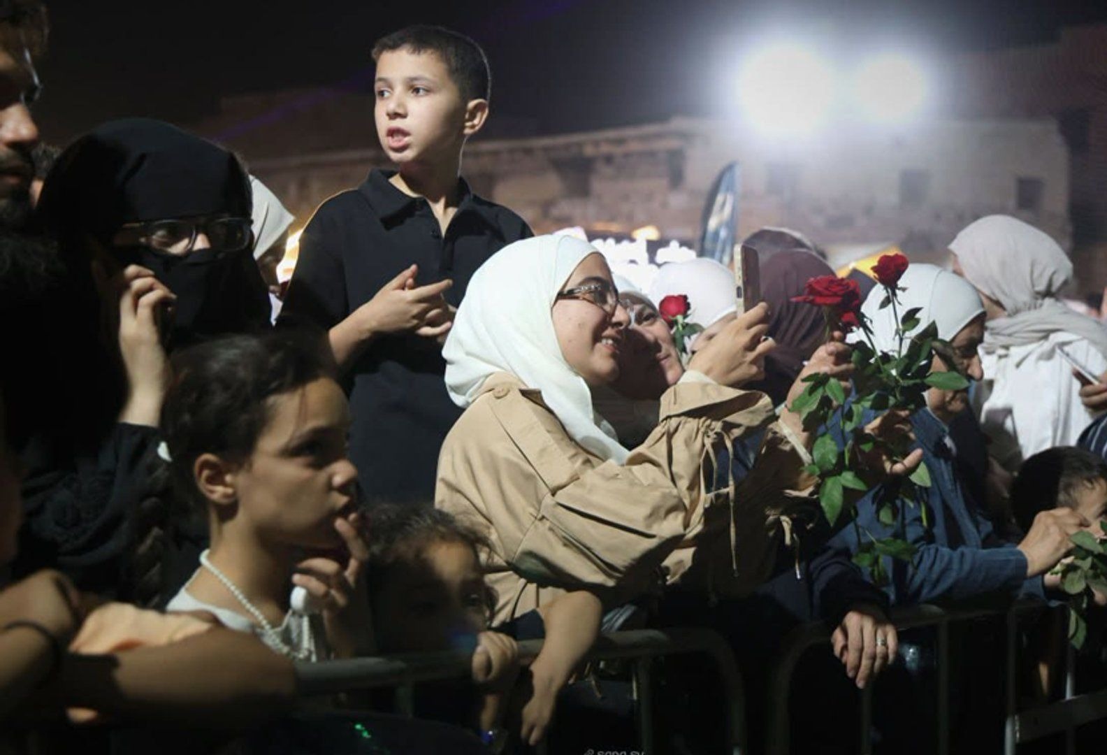 Syrian Army Helicopters Drop Roses on Damascus Festival Crowds Syrian Army Helicopters Drop Roses on Damascus Festival Crowds