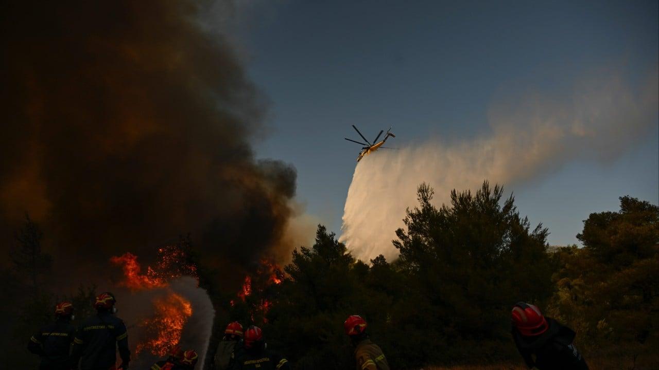 Greece Wildfire Crisis: Helicopters Collide in Mid-Air Greece Wildfire Crisis: Helicopters Collide in Mid-Air