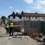 Tragic House Fire Near Middlesbrough: Two Men Arrested as Child Among Fatalities