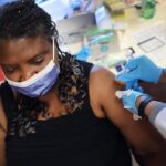 Experts Urge Early Flu Vaccination Amid Rising Covid Cases