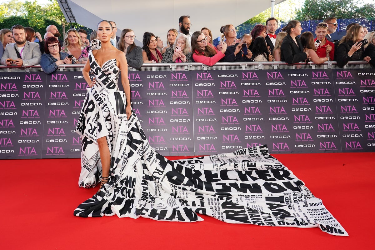 Tulisa Makes Bold Statement at NTA Red Carpet with Gown Featuring Drug Sting Headlines Tulisa Makes Bold Statement at NTA Red Carpet with Gown Featuring Drug Sting Headlines