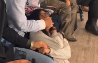 Fashion CEO Confronts Animal Rights Protester at NYFW Show