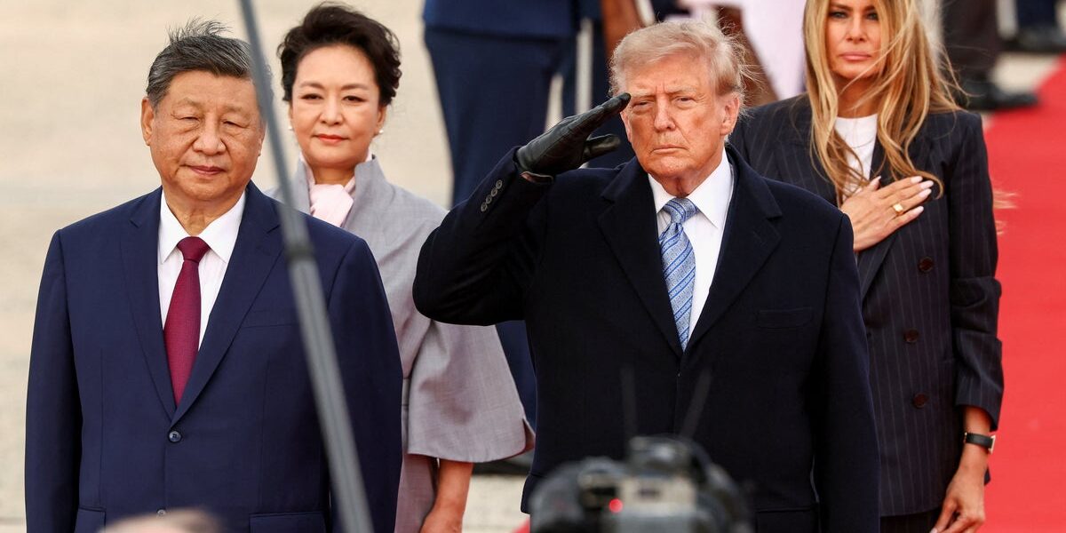 Trump Draws Criticism for Winter Gear at Xi Jinping’s Airport Welcome