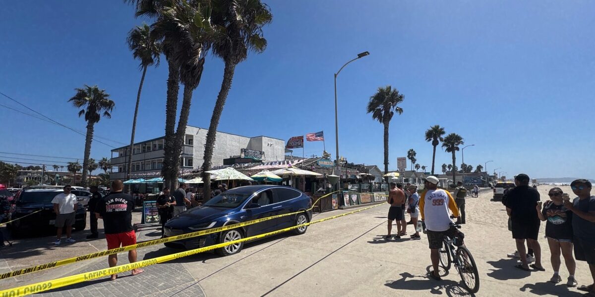 Man Fleeing Stolen Tesla Hits Woman on San Diego Boardwalk, Chased by Bystanders