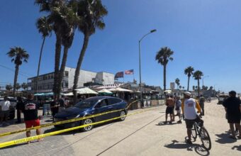 Man Fleeing Stolen Tesla Hits Woman on San Diego Boardwalk, Chased by Bystanders