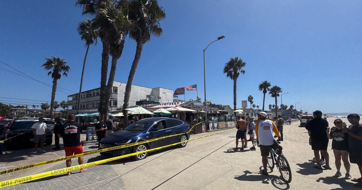 Man Fleeing Stolen Tesla Hits Woman on San Diego Boardwalk, Chased by Bystanders