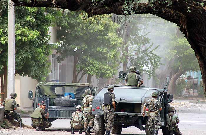 Colombia Extradites Notorious Warlord to U.S. as Security Strategy Shifts