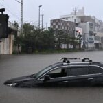 Typhoon Threatens Tokyo with Floods and Landslides as Strong Winds Loom Typhoon Threatens Tokyo with Floods and Landslides as Strong Winds Loom