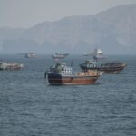 Two Singapore-Registered Container Ships Struck by Projectiles in Strait of Hormuz, One Sinks